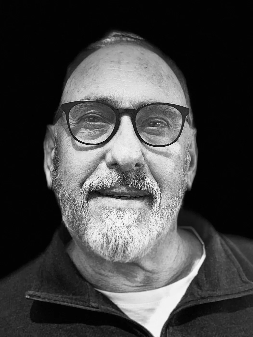 Black and white portrait of photographer Graeme Newman